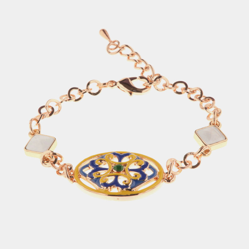 Bracciale in Metallo cristalli bianchi con dettaglio centrale in maiolica a fiore smaltata blu e giallo — collezione CALTAGIRONE