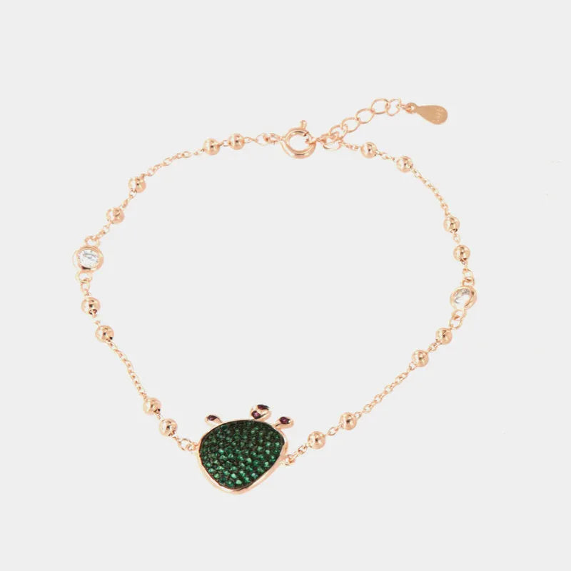 Bracciale in Argento 925 con ciondolo fico d'india, impreziosito da pavè di zirconi smeraldo, su base brunita — collezione SICILY 925